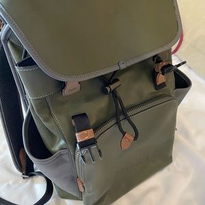 Coach green men’s backpack.